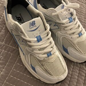 New Balance White and Blue Athletic Sneakers